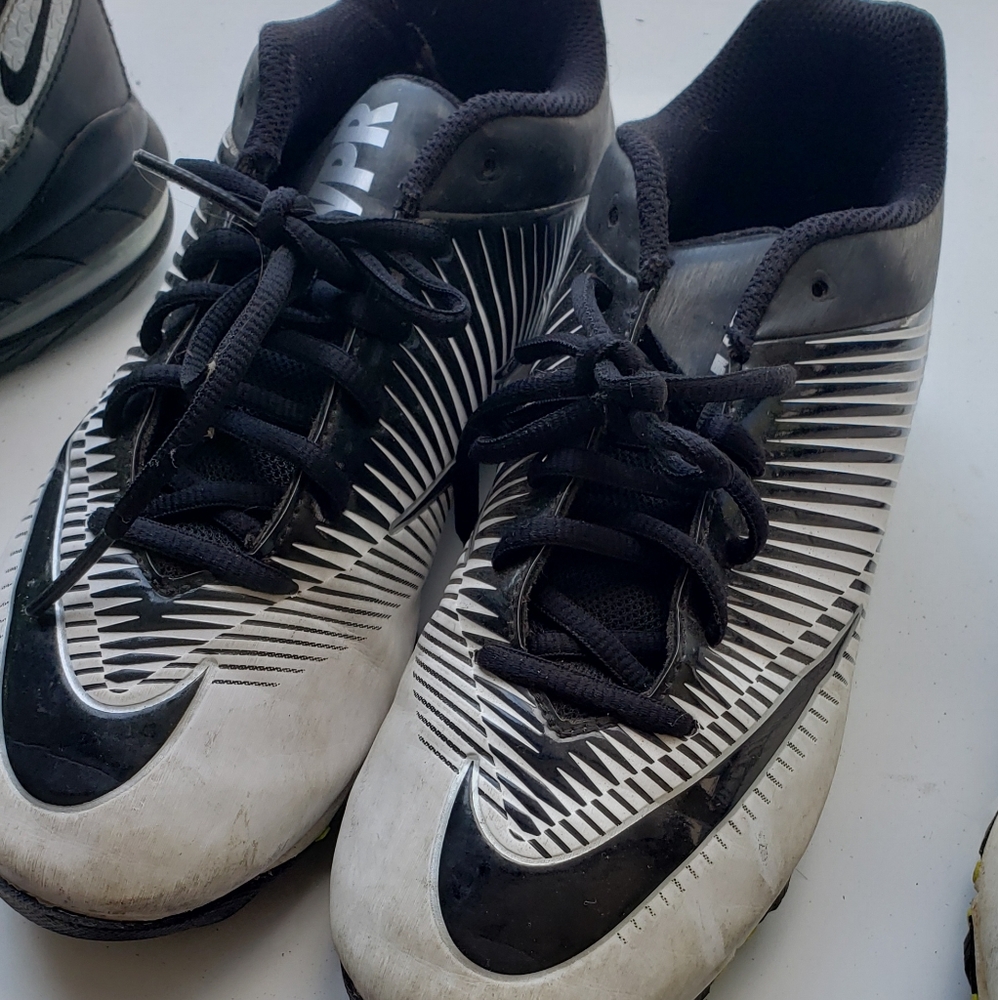 Two pairs of cleats